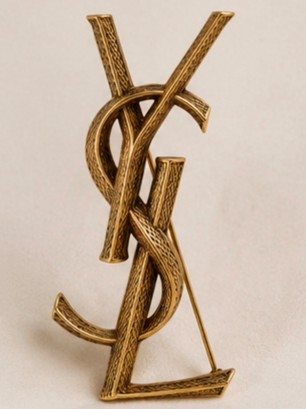 Authentic YSL Gold Logo Brooch